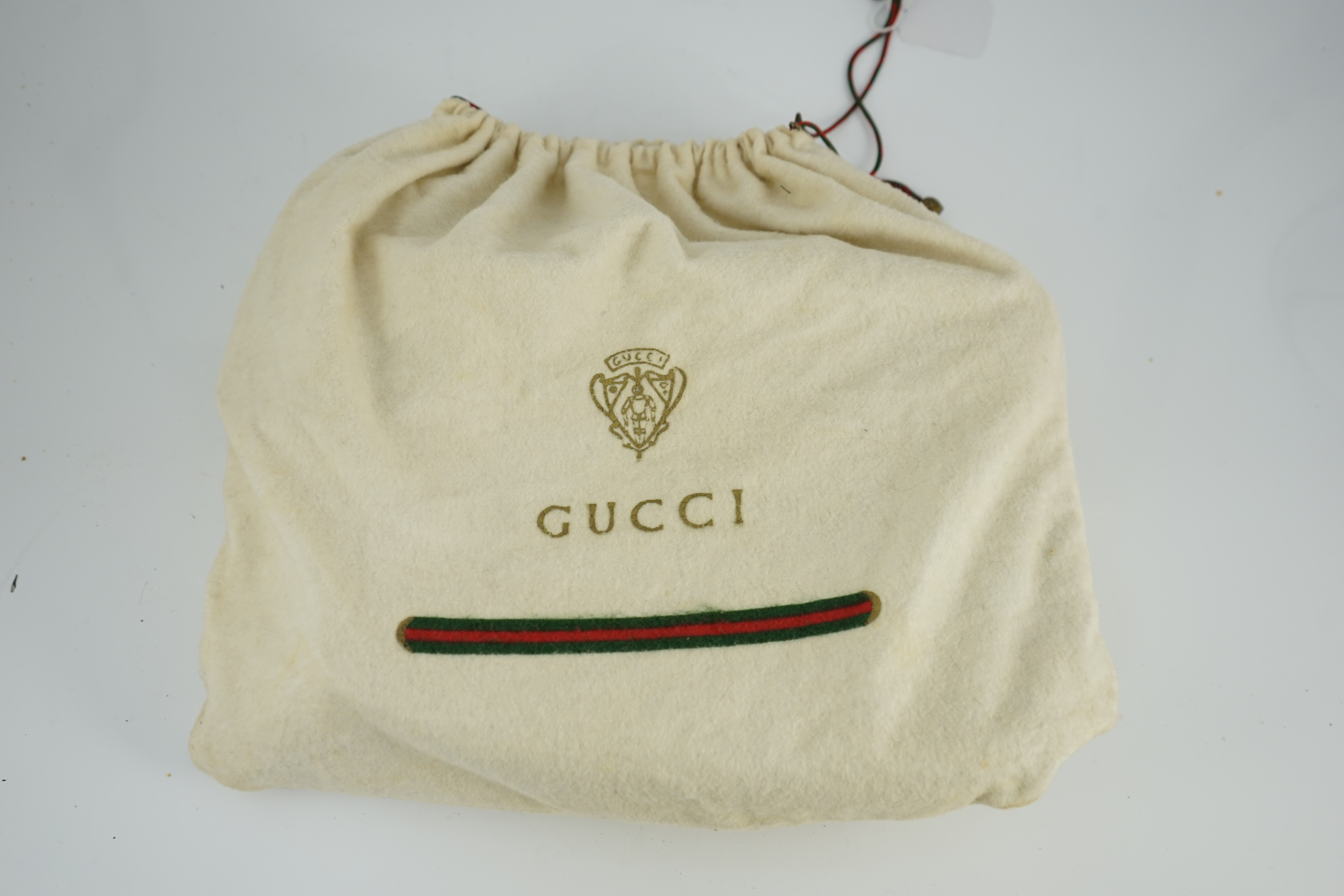 Three vintage Gucci hand bags and clutch wallet